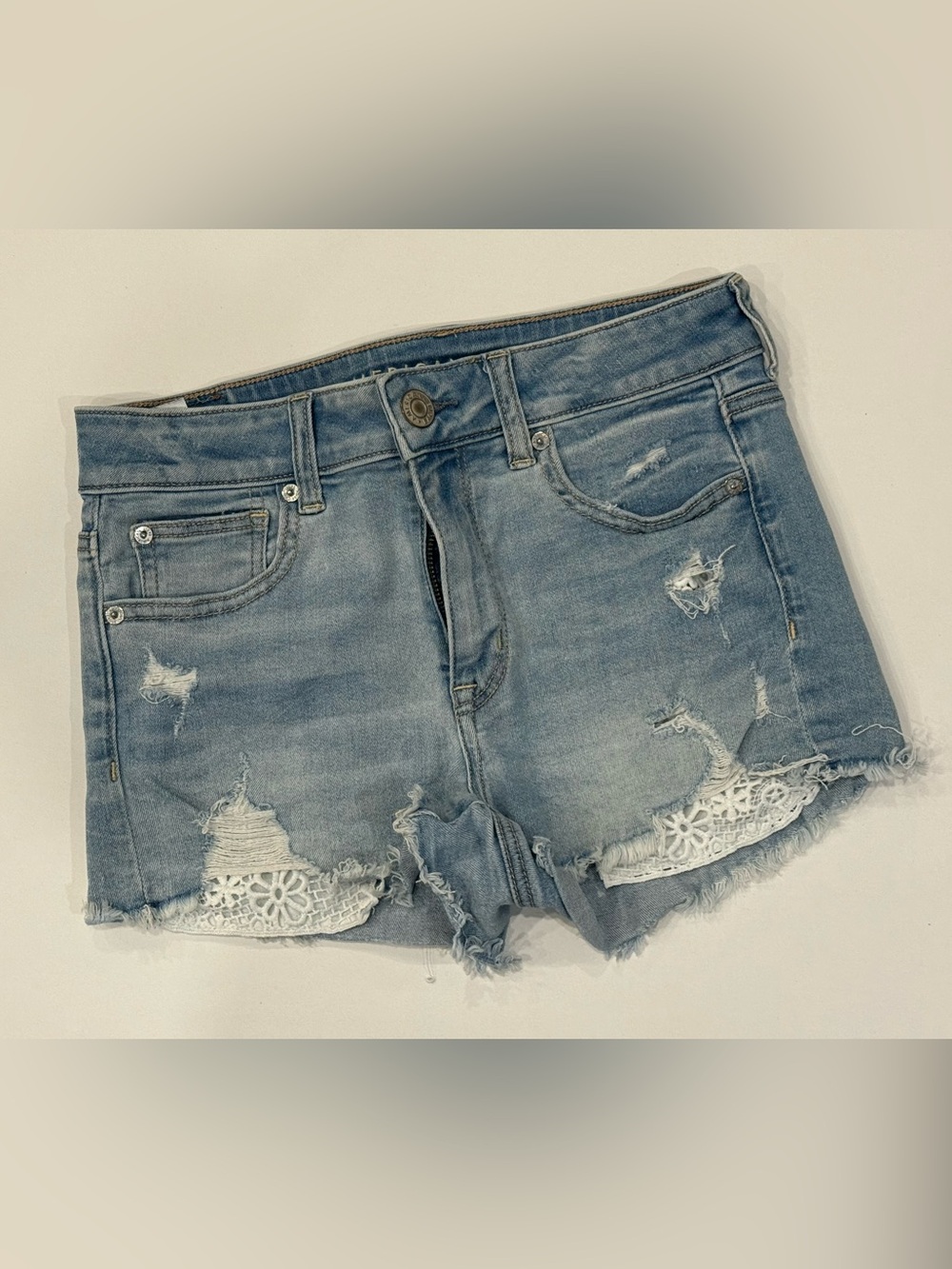 American Eagle Outfitters Light Blue Distressed Denim Shorts with Lace Trim